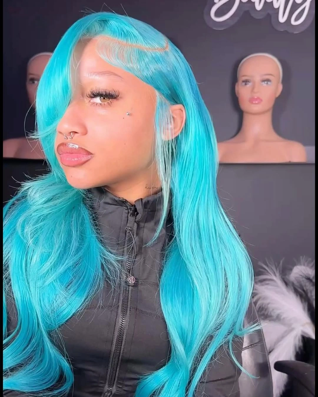 Long bright turquoise hair with swept front section