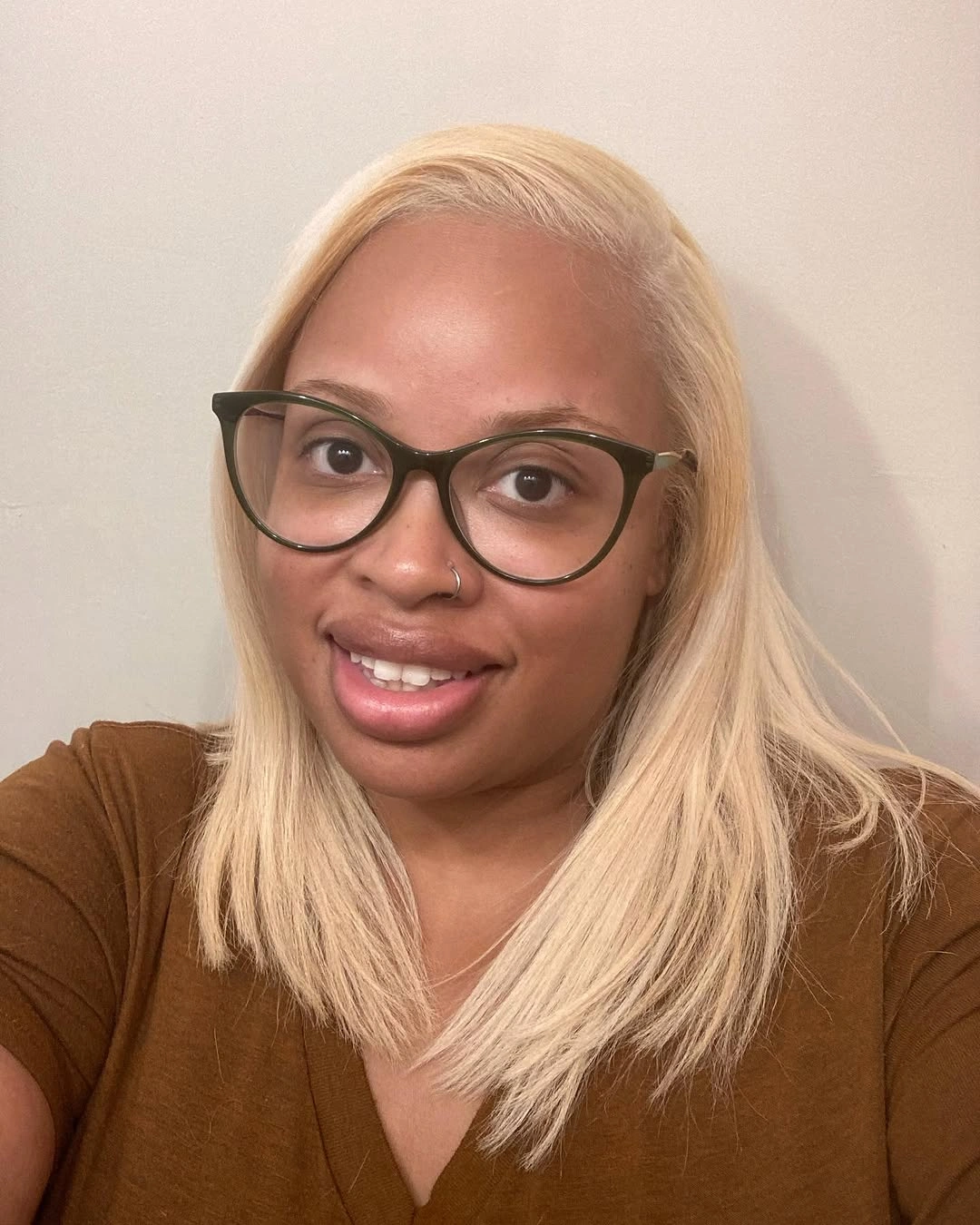 Straight pale blonde hair with clean shoulder length ends