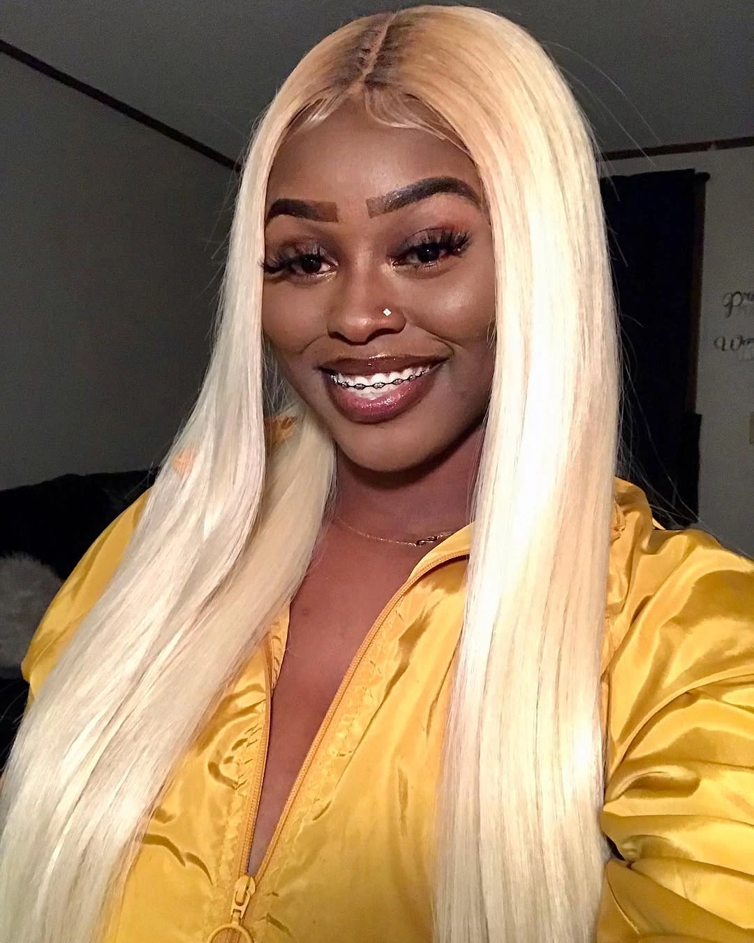 Very long straight pale blonde hair with center part