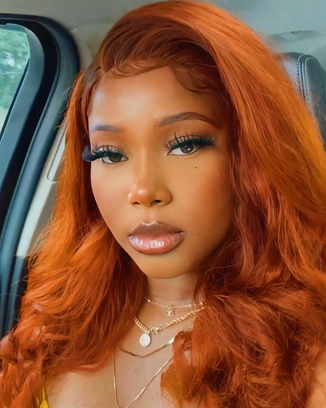 Long copper orange waves with side swept front