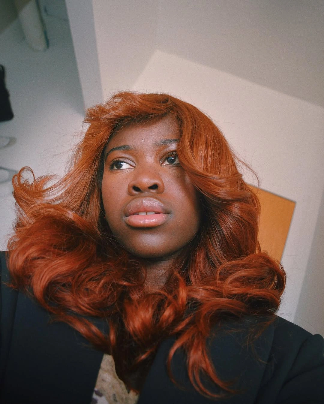 Copper auburn waves with side swept rounded ends