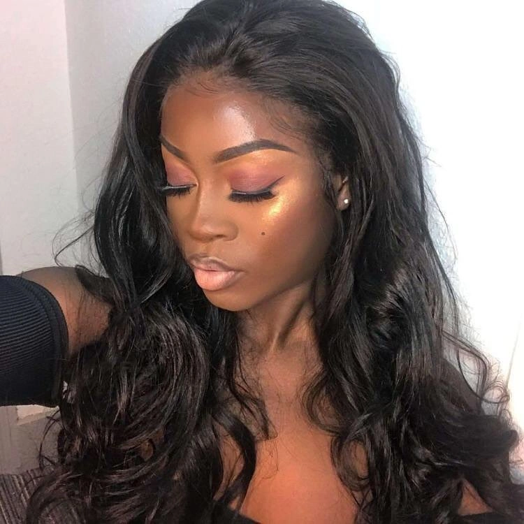 Long black waves with side part and curled ends