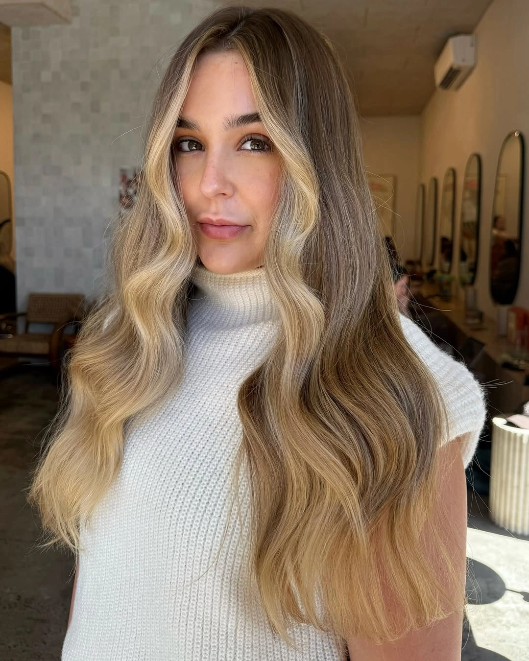 Long bronde hair with bright blonde face-framing pieces