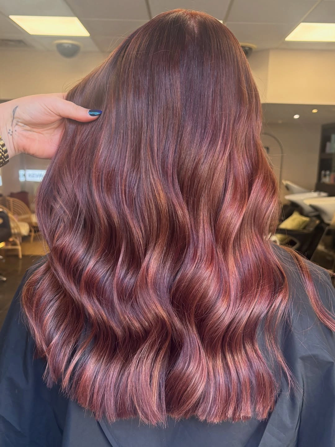 Shoulder-to-long wavy rose mauve hair from the back