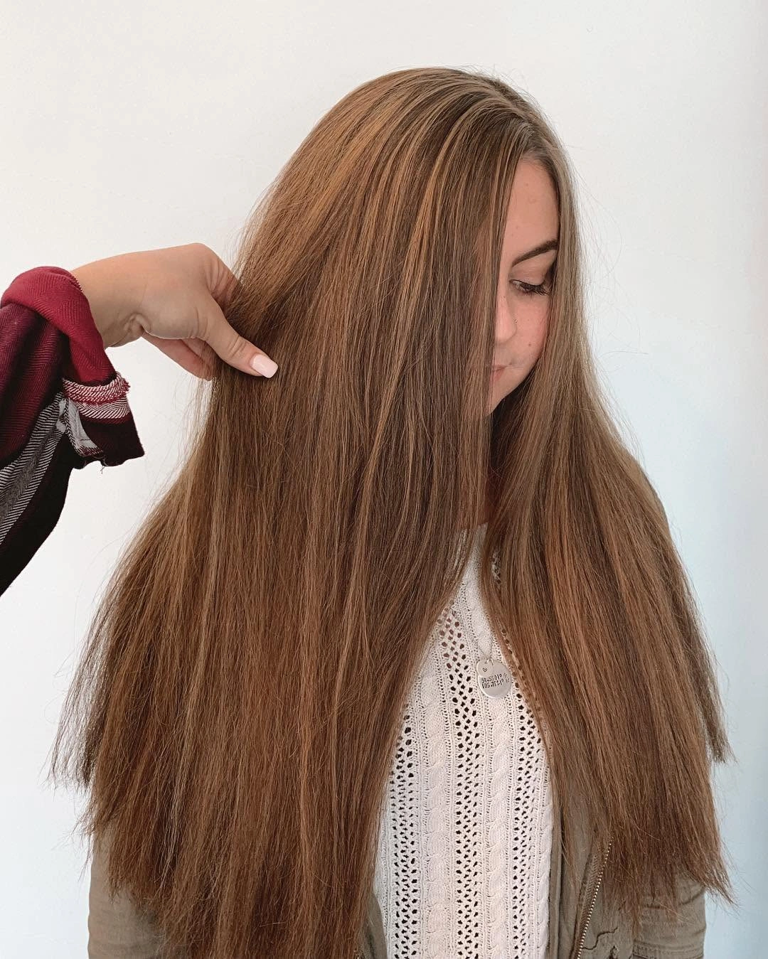 Long straight light-brown hair with subtle long layers