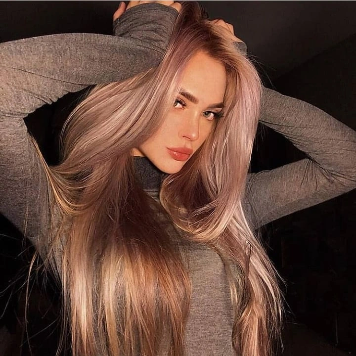 Long wavy light-pink hair shown from the front