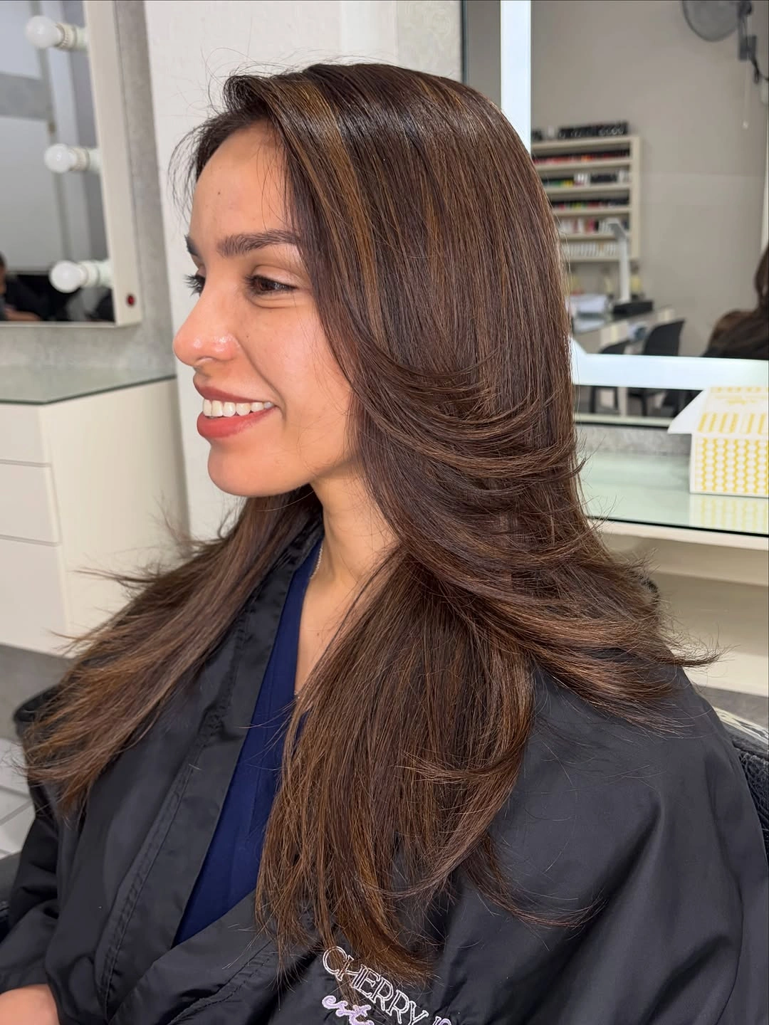 Brunette long layers with sweeping front pieces