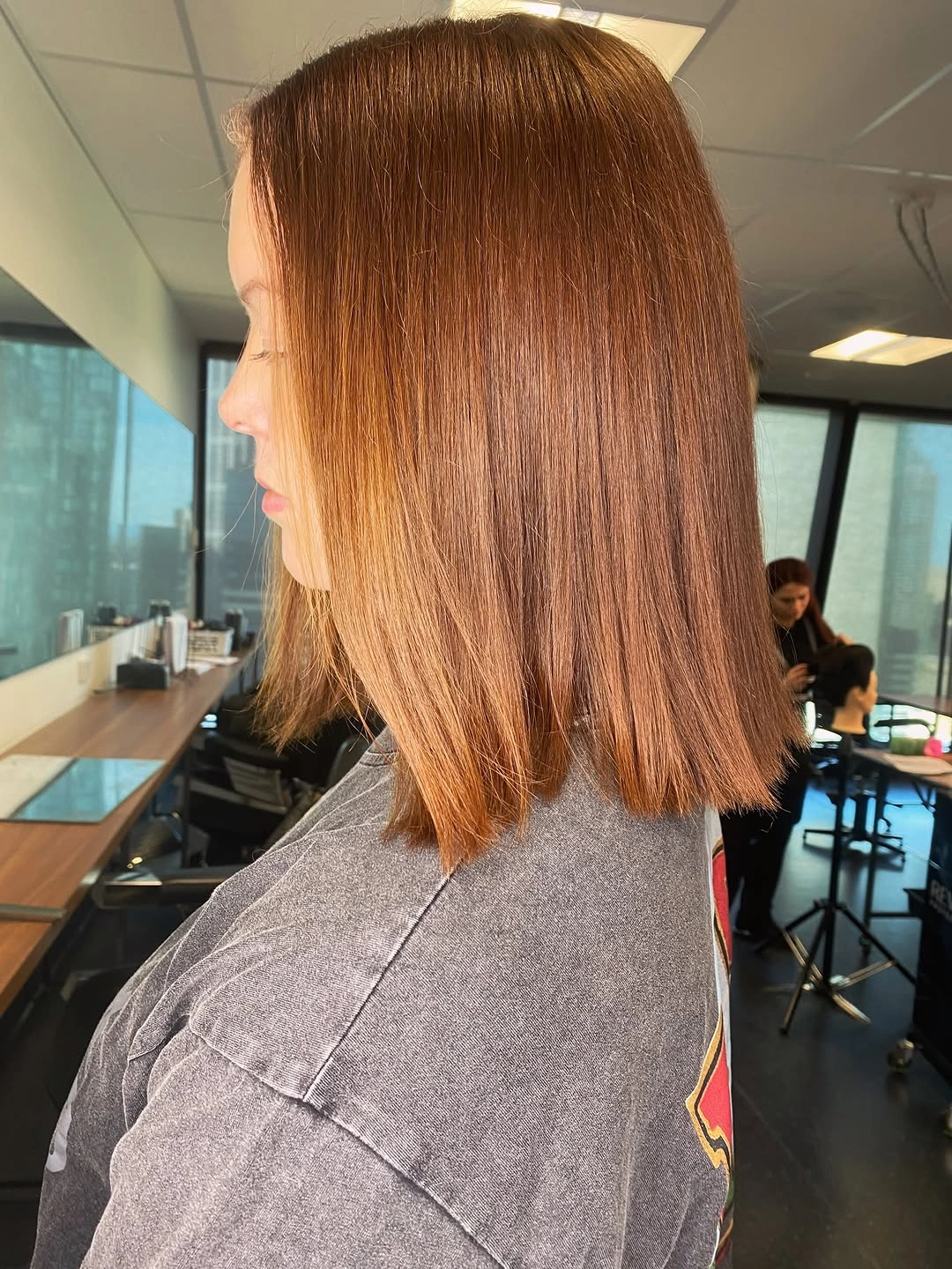 Straight copper lob with blunt shoulder-skimming ends