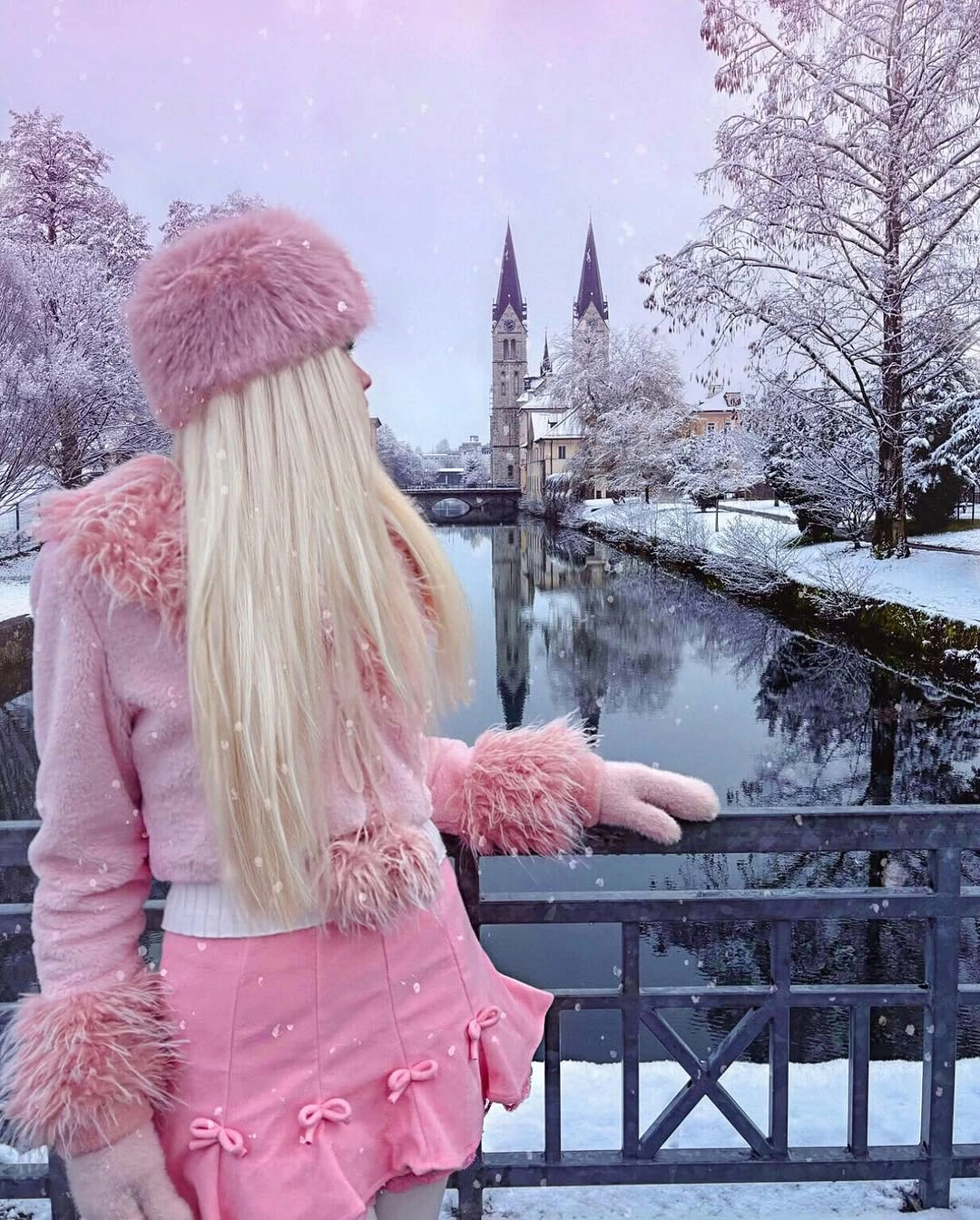Pink short skirt with bow details and fuzzy-looking pink layers
